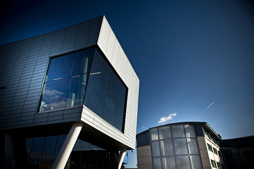 Clear sky, building tops.