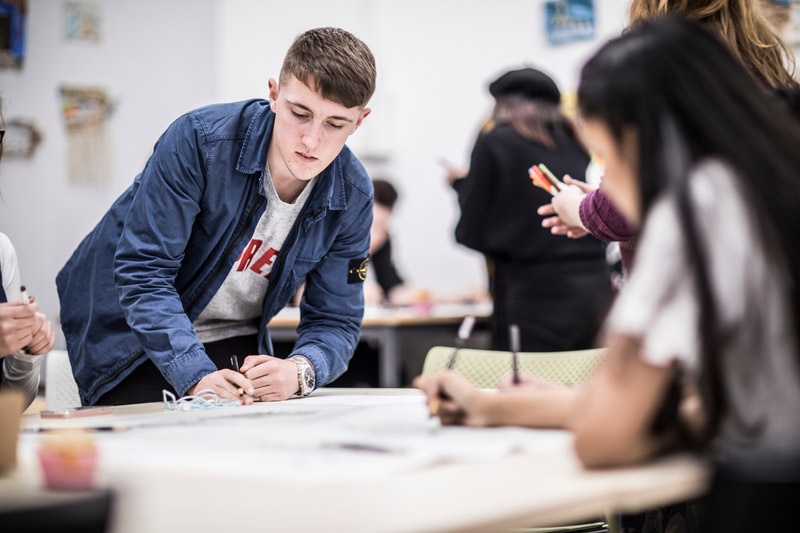 A student from ADA working on some illustrations